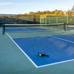 Comment une construction court de tennis resine synthetique à Paris améliore-t-elle le confort de jeu des pratiquants ?